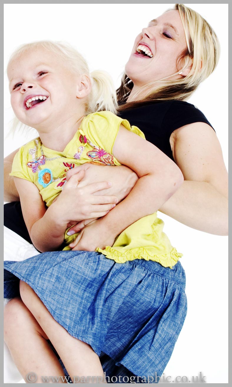 Studio Portrait of a mother and daughter
