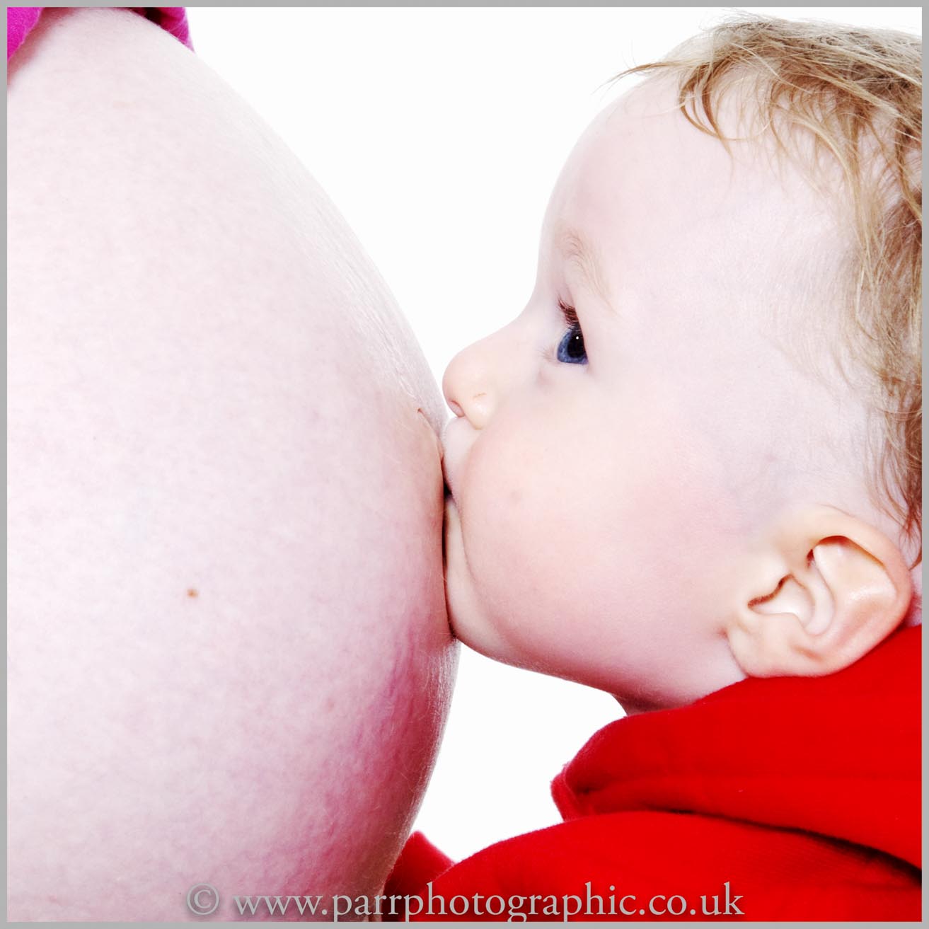 Studio Portrait of mother bump and child 