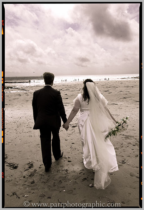 Bride and groom on Wembury beach Devon